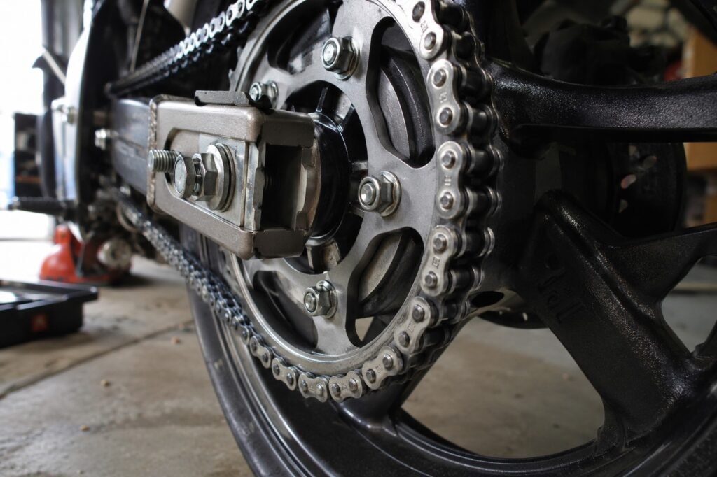 Close-up of a 525 motorcycle chain on a rear sprocket