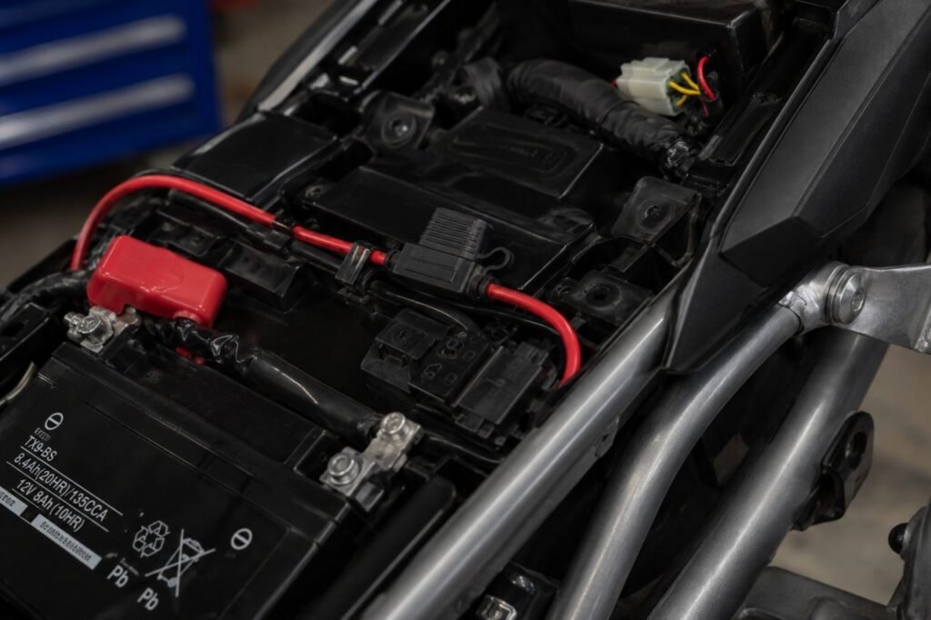 Inline fuse installed on motorcycle battery for LED auxiliary lights wiring