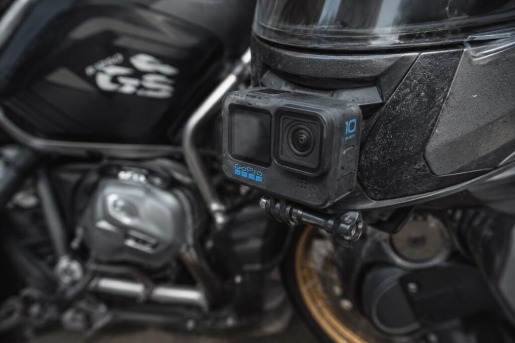 Action camera mounted on motorcycle chin bar for vibration and stabilization testing