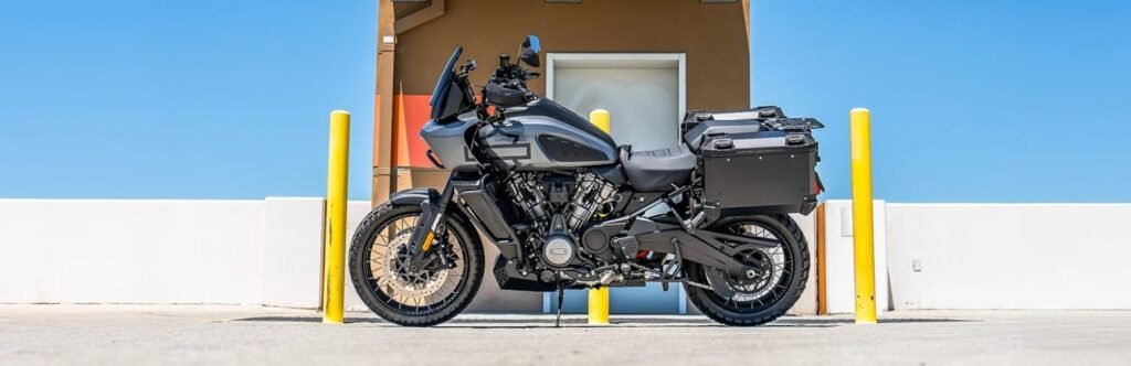 Adventure motorcycle equipped with hard-shell side cases for touring